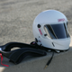 A HANS device, worn around a driver’s neck in the car.